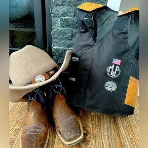 Set of kids cowboy boots, hat and vest size large.